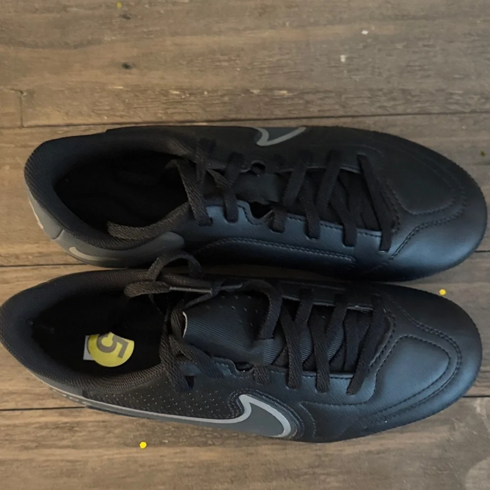 Nike Tiempo Men’s Black Soccer Cleats with Silver Swoosh